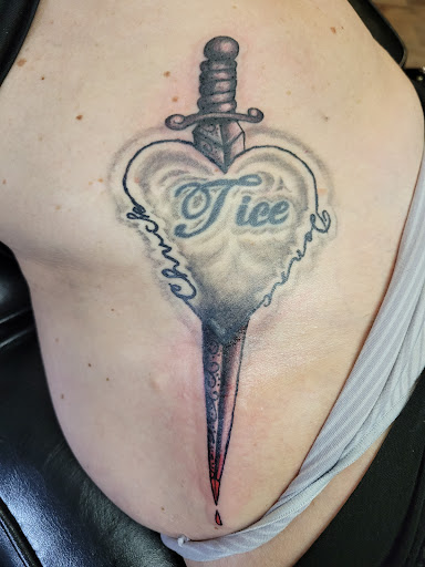 Explore palm size tattoos ideas, creative tattoo ideas in Pikeville, available at The Carbon Canary Tattoo Studio