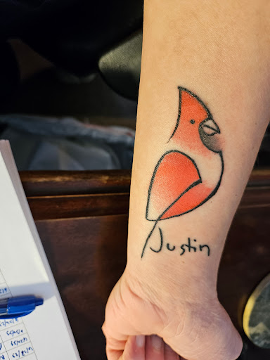 Find under the breast tattoo ideas for your next unique tattoo in North Charleston at Blu Gorilla Tattoo