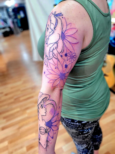 Explore knee cap tattoo ideas for men, creative tattoo ideas in Benton, available at Spectrum Tattoo