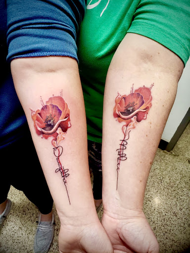 Explore honeycomb tattoo ideas, creative tattoo ideas in Clarksville, available at Uncle Bobs Tattoos