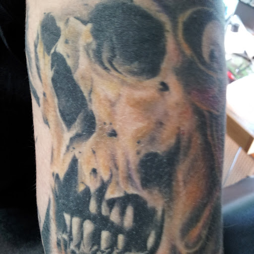 Explore front neck tattoo ideas, creative tattoo ideas in Rensselaer, available at A Vita Tattoo