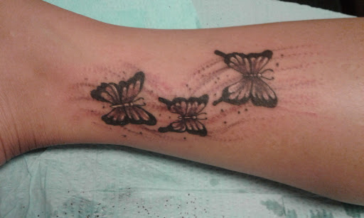 Explore men back tattoos ideas, creative tattoo ideas in Seymour, available at American Gypsy Tattoo Corp.