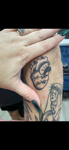 Explore small face tattoo ideas male, creative tattoo ideas in Brandon, available at Forever Yours Tattoo and Piercing