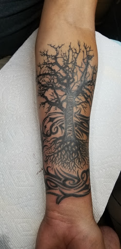 Tattoo Shop «Landmark Tattoo», reviews and photos, 609 E 13th Ave, Denver, CO 80203, USA