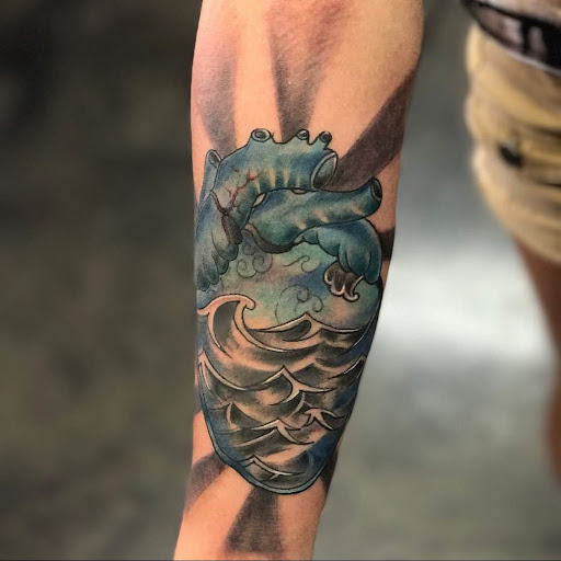 Explore lower sleeve tattoo ideas, creative tattoo ideas in Garden Grove, available at Dr. Tattoo Studio