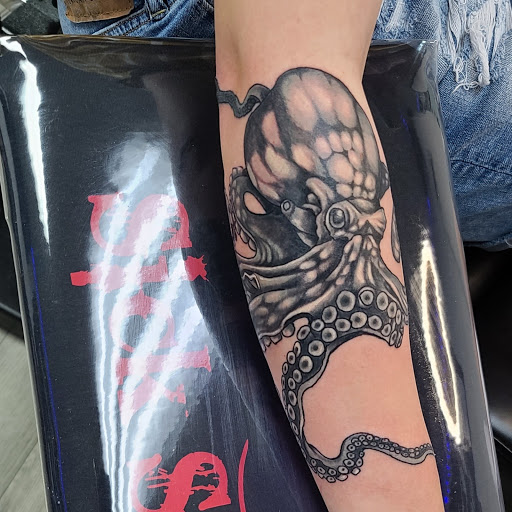 Explore animal sleeve tattoo ideas, creative tattoo ideas in Cuyahoga Falls, available at Sick Skins Skin Art Studio