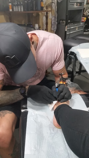 Explore amity affliction tattoo ideas, creative tattoo ideas in Auburn, available at Against All Odds Tattoo