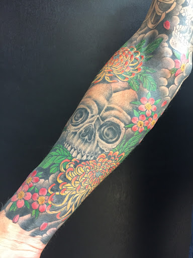 Explore tattoo ideas for men on forearm, creative tattoo ideas in Neptune, available at Neptune Tattooville