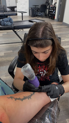 Explore concert tattoo ideas, creative tattoo ideas in Orlando, available at Fine Ink Studios Tattoos