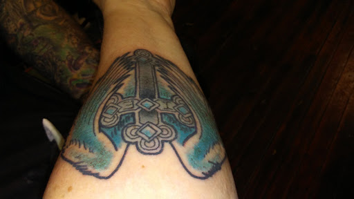 Tattoo Shop «Ink and Iron Tattoo Parlour and Gallery», reviews and photos, 1505 Adams St, Toledo, OH 43604, USA