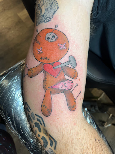 Explore pin up girl tattoo ideas, creative tattoo ideas in Meadville, available at Lucky Lucys Tattoo and Art Studio