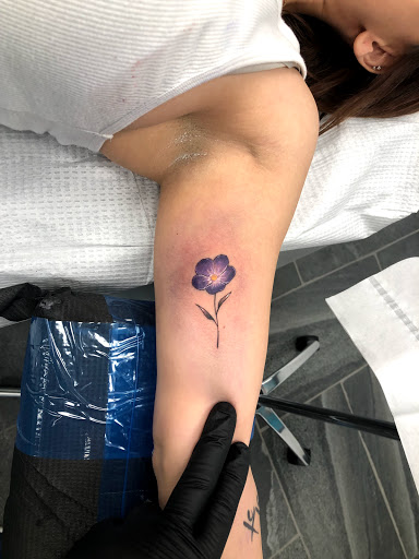Explore snowboarding tattoo ideas, creative tattoo ideas in Lockport, available at Archer Ink Tattoo