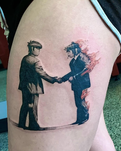 Explore hunger games tattoo ideas, creative tattoo ideas in Fenton, available at Think Ink Tattoo Co