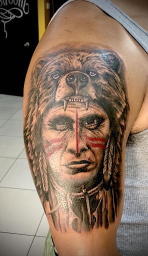 Explore warrior tattoo ideas for guys, creative tattoo ideas in Saint Petersburg, available at Edens Apple Tattoos and Piercings