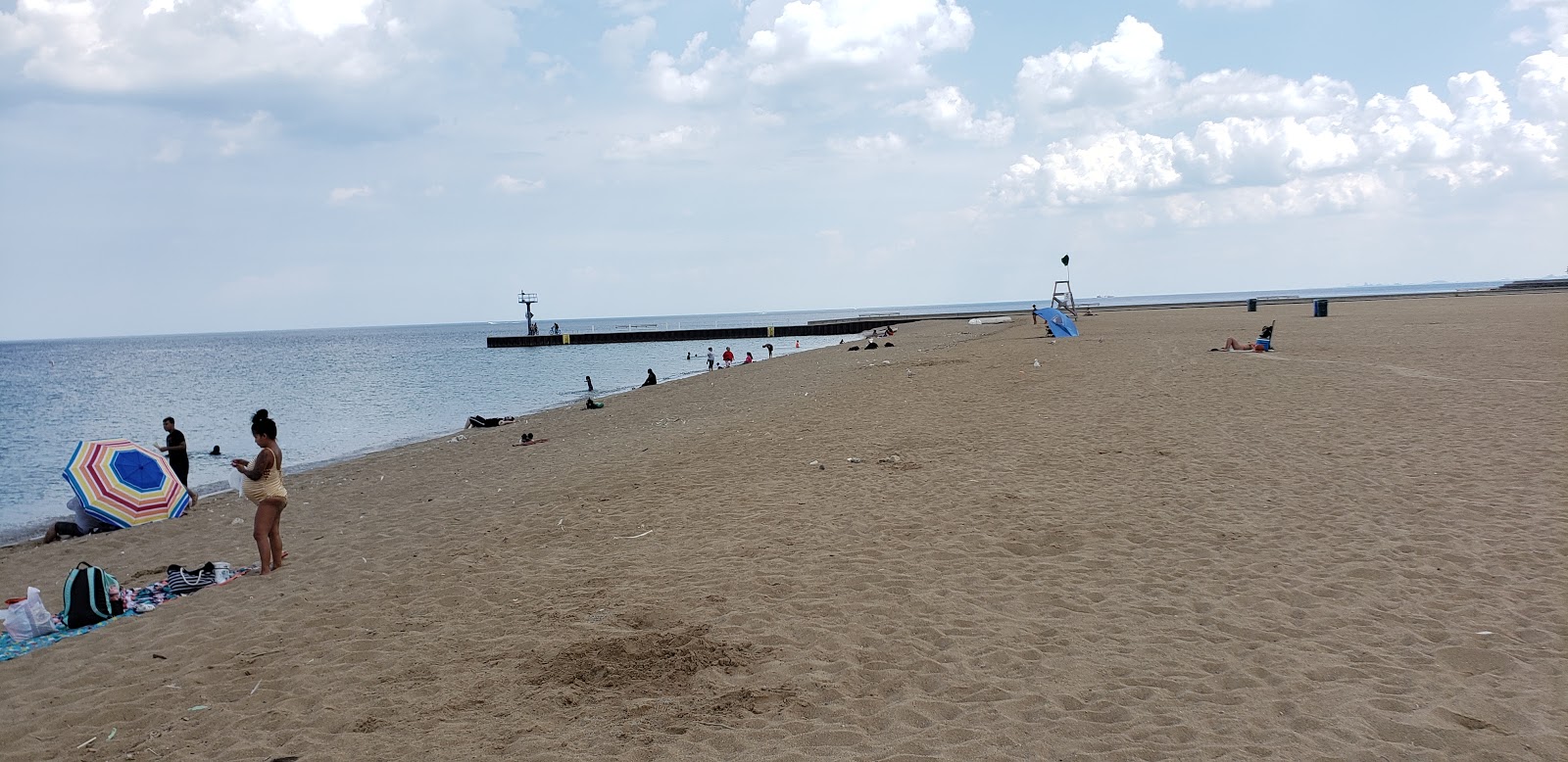 Foto von Oakwood Beach mit beiger sand Oberfläche