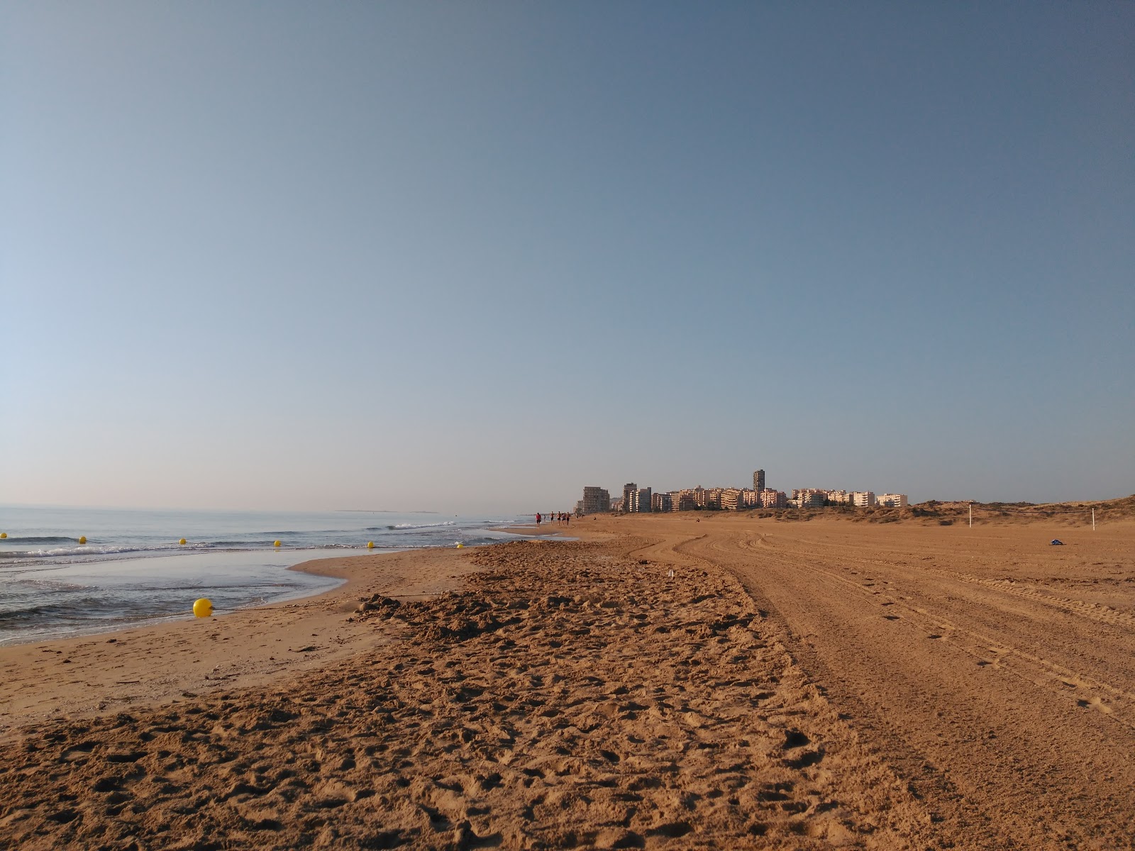 Fotografija Libre de el Altet z rjavi pesek površino