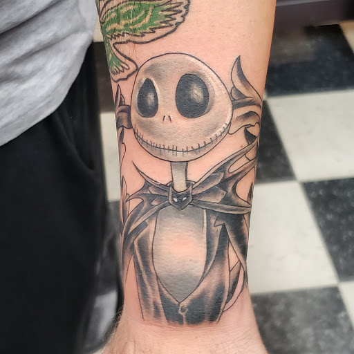 Explore dart tattoo ideas, creative tattoo ideas in Bristol, available at Black Sparrow Tattoo Studio