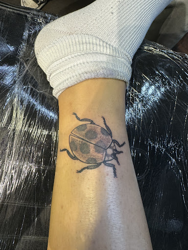 Find cloud tattoo ideas for your next unique tattoo in San Diego at Sideshow Tattoo and Piercing