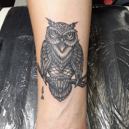 Explore tattoo ideas for dead dog, creative tattoo ideas in Medina, available at Art In Motion Inc Tattooing