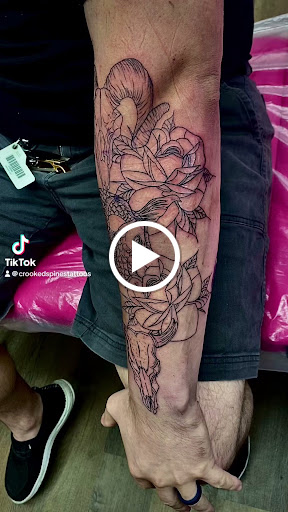 Explore elizabeth tattoo ideas, creative tattoo ideas in Lake City, available at Crooked Spines Tattoo Studio