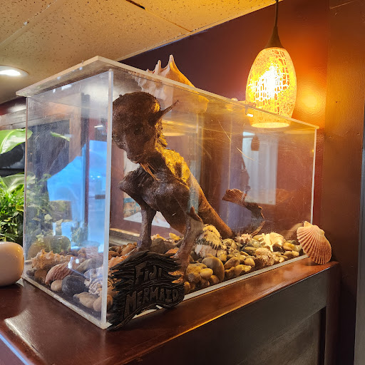 Explore jesus tattoo sleeve ideas, creative tattoo ideas in Asheville, available at Dark and Deviant Oddities