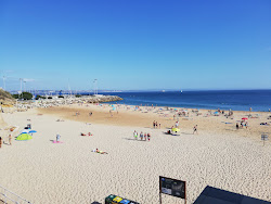 Foto von Praia da Torre und die siedlung
