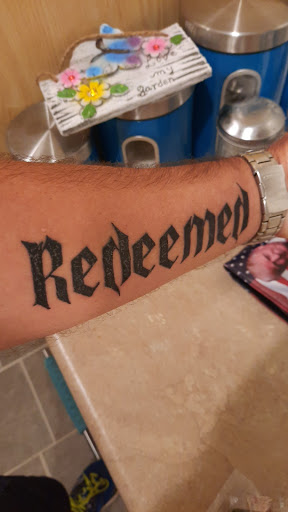 Find lion hand tattoo ideas for men for your next unique tattoo in Talbott at Self Made Tattoo