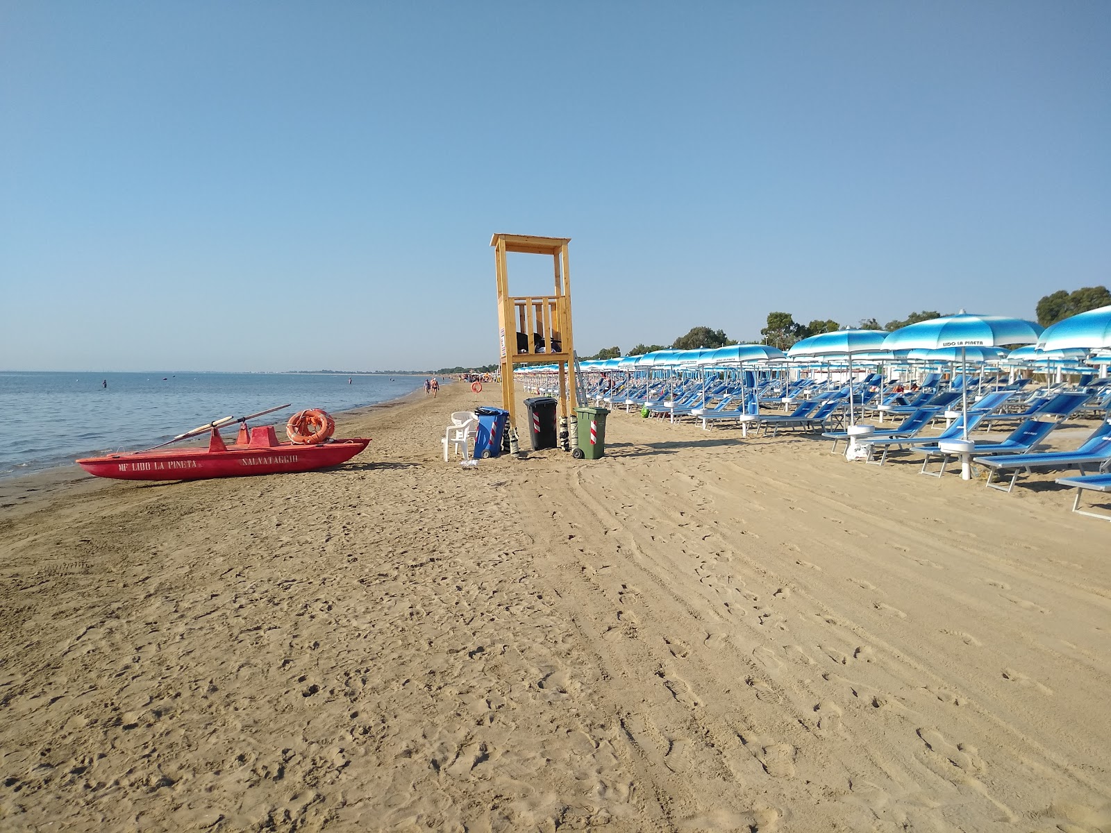 Fotografija Capolinea Beach z svetel pesek površino
