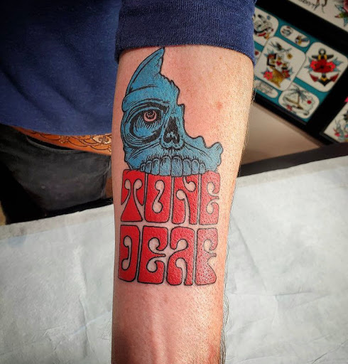 Explore cheating death tattoo ideas, creative tattoo ideas in Libertyville, available at Lucky Seven Tattoo