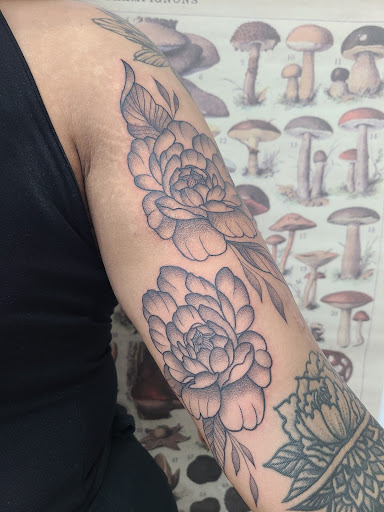 Explore marigold tattoo ideas, creative tattoo ideas in Saint Petersburg, available at Lucky You Tattoo