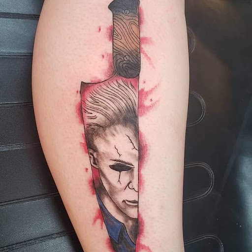 Explore feather tattoo ideas for men, creative tattoo ideas in Decatur, available at Exclusive Ink Tattoos & Body Piercings 22nd & Wood