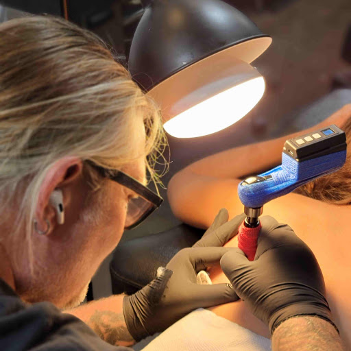 Explore rose and skull tattoo ideas, creative tattoo ideas in Sarasota, available at Z-Edge Tattoo & Body Piercing South Shop