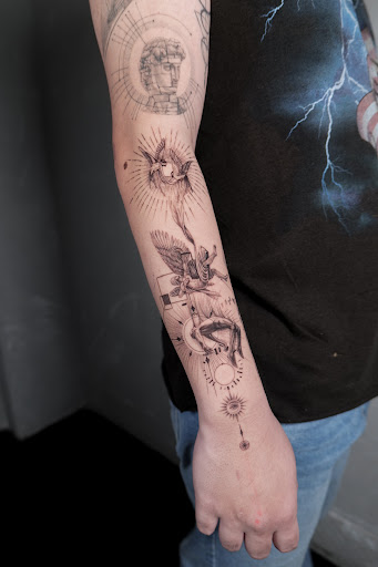 Explore tattoo ideas on back of neck, creative tattoo ideas in Los Angeles, available at Ethos Art Haus Tattoo
