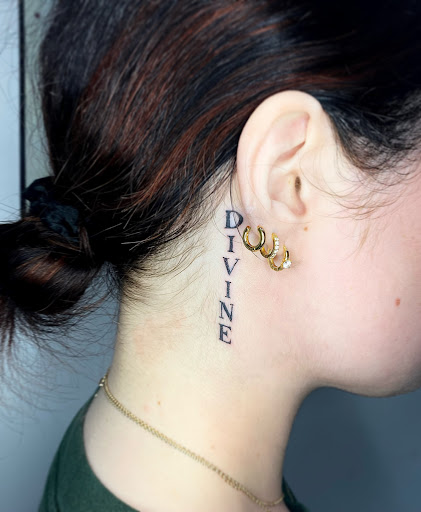 Explore spine tattoo ideas male, creative tattoo ideas in Wilmington, available at Rogue Tattoo Studio