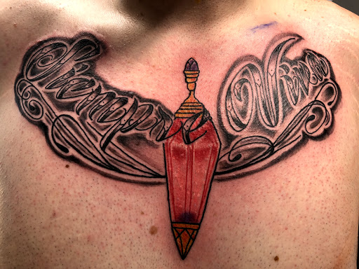 Explore side of neck tattoo ideas, creative tattoo ideas in Barberton, available at Magic City Tattoo Company