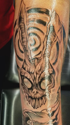 Explore lamb tattoo ideas, creative tattoo ideas in Tarpon Springs, available at Legacy Blue Tattoo Studio and Laser Removal