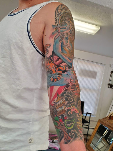 Explore haitian tattoo ideas, creative tattoo ideas in Windsor Locks, available at Reigning Ink Tattoo Studio