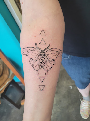 Explore in god we trust tattoo ideas, creative tattoo ideas in Moscow, available at Moscow Tattoo Company