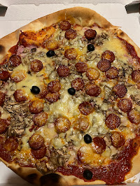 Plats et boissons du Pizzeria Pizza Planet à Pignan - n°1