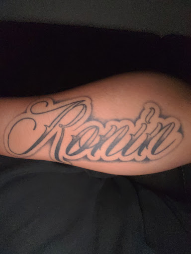 Explore tattoo ideas for teens, creative tattoo ideas in Orange, available at Top Floor Tattoo Studio