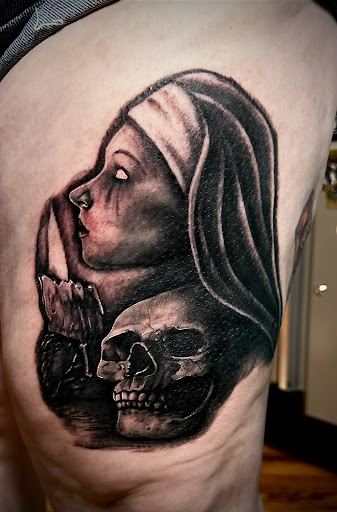 Explore shoulder tribal tattoo ideas, creative tattoo ideas in Fort Oglethorpe, available at The Helm Tattoo & Piercing