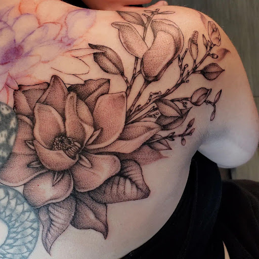 Explore sunflower tattoo idea, creative tattoo ideas in Palm Harbor, available at Angry Owl Tattoo and Piercing