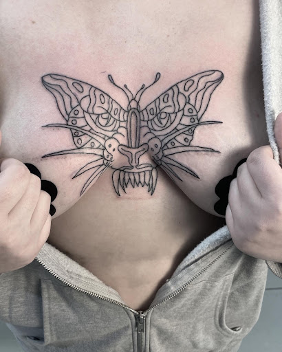 Explore horizontal tattoo ideas, creative tattoo ideas in Cincinnati, available at Opal Moon Tattoo