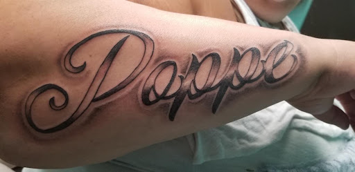 Explore boyfriend name tattoo ideas on chest, creative tattoo ideas in Hayward, available at Three Tentacles Tattoo Studio