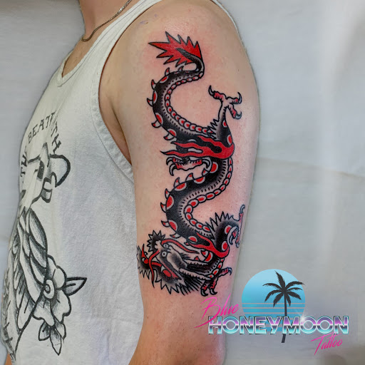 Explore cougar tattoo ideas, creative tattoo ideas in Islip, available at Blue Honeymoon Tattoo