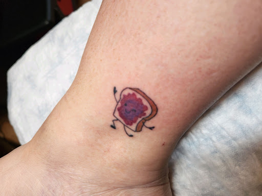 Explore king of the hill tattoo ideas, creative tattoo ideas in Minocqua, available at Walking Arts Tattoos