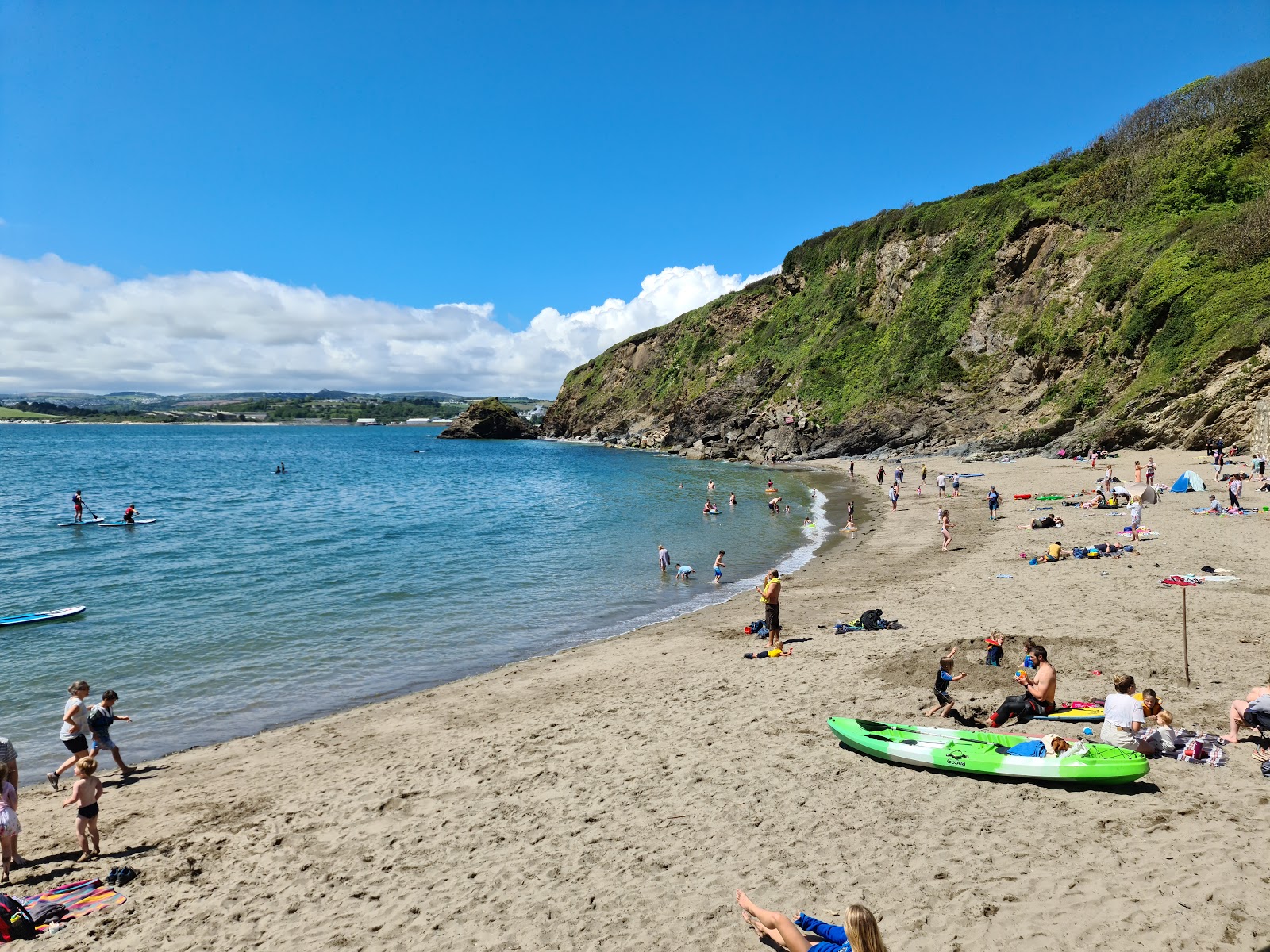 Photo of Polkerris beach with bright sand surface