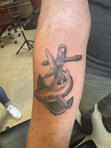 Find animal neck tattoo ideas for your next unique tattoo in Kill Devil Hills at Croatan Tattoo Company