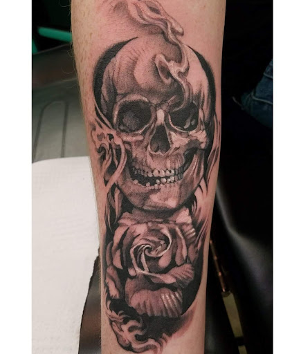 Explore spine tattoo ideas for men, creative tattoo ideas in Colorado Springs, available at Empire Tattoo Co.