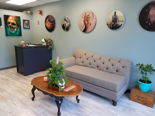 Find tattoo anklet ideas for your next unique tattoo in Goffstown at River Rose Tattoo and Art Gallery